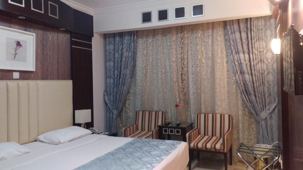 Kuwait Continental Hotel Кувейт Стая снимка
